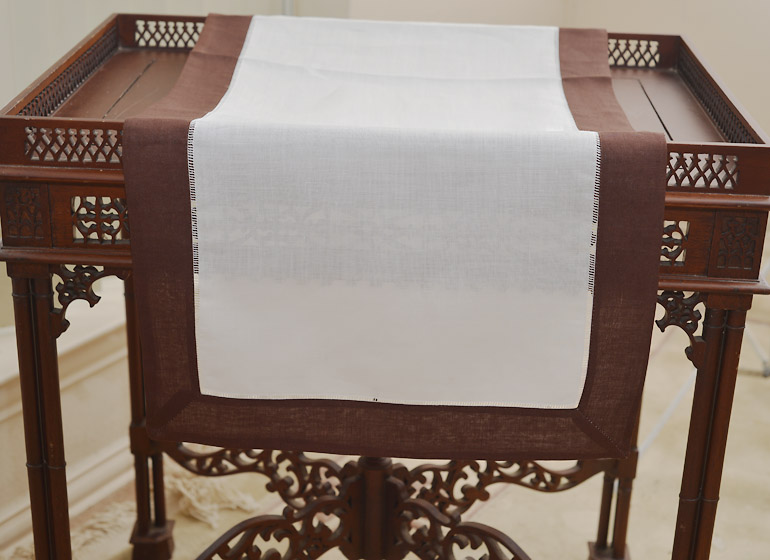 Hemstitcb Table Runner, Color On Chocolate Brown Color Border.