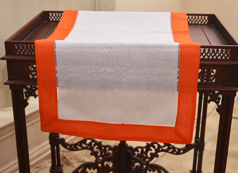 Hemstitcb Table Runner, Color On Hot Orange Color Border.